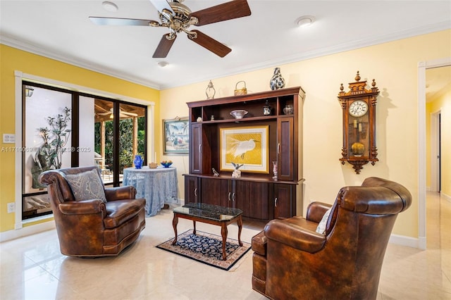 living area featuring ceiling fan, ornamental molding, and french doors