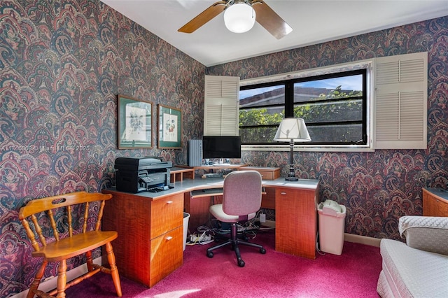 carpeted home office with ceiling fan