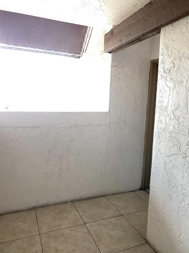 interior space featuring tile patterned flooring