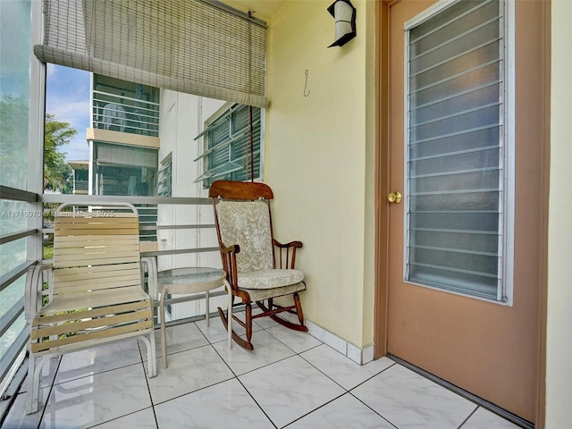 doorway to property with a balcony