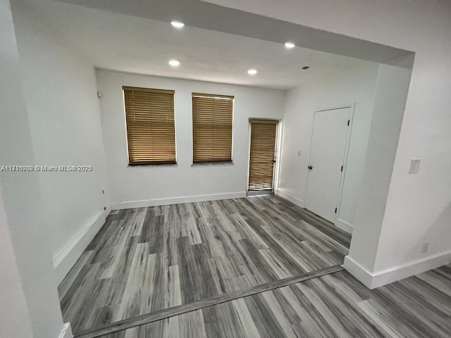 spare room featuring light wood-type flooring