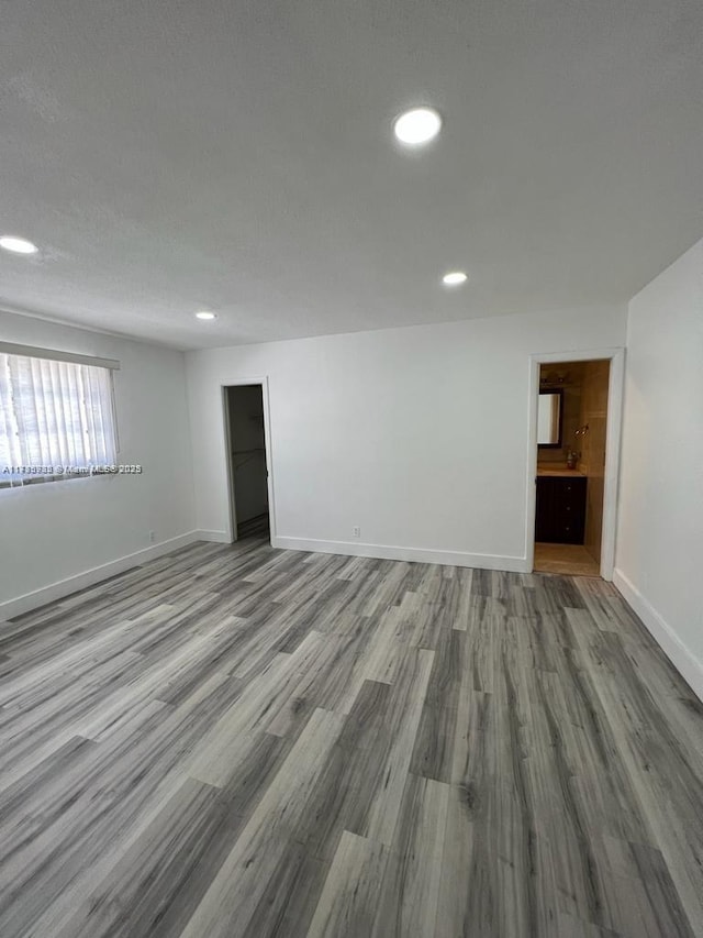 unfurnished room with light hardwood / wood-style floors