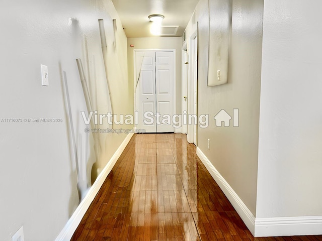 hallway featuring wood-type flooring