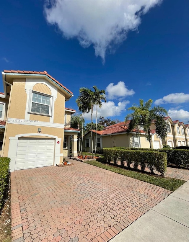 view of front of property with a garage