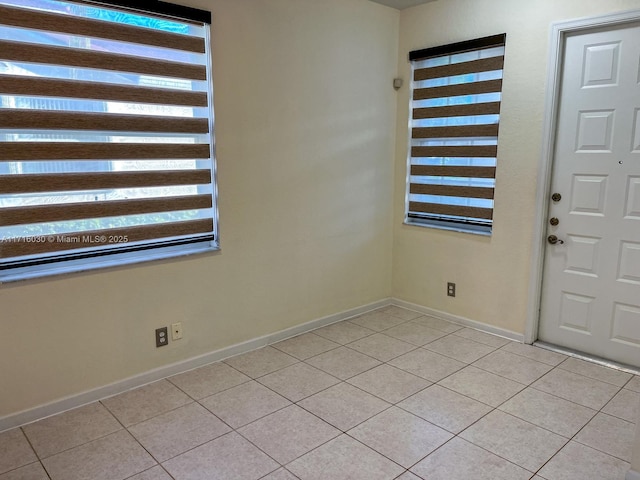 view of tiled foyer entrance