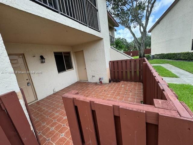 view of patio with a balcony