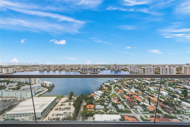 balcony featuring a water view