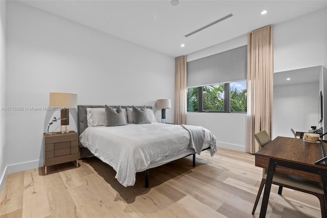 bedroom with light wood-type flooring