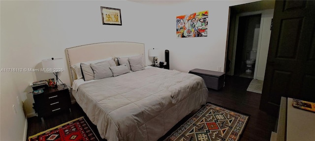 bedroom featuring hardwood / wood-style floors