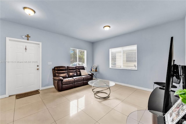 living room with light tile patterned flooring