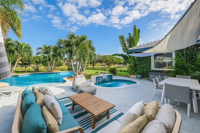 view of swimming pool featuring a patio, pool water feature, and outdoor lounge area