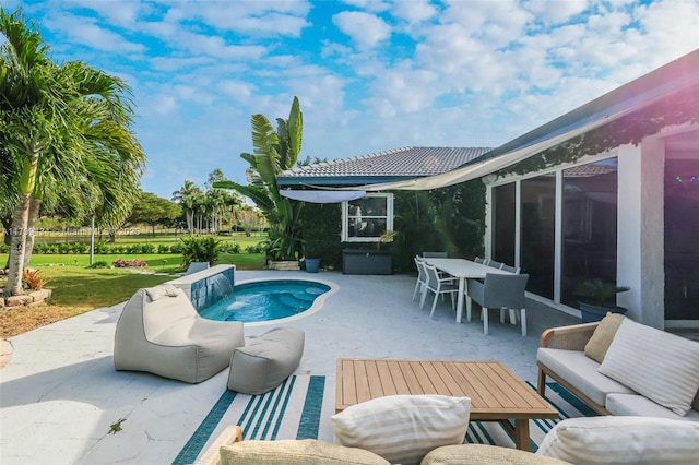 view of pool featuring a patio area and outdoor lounge area