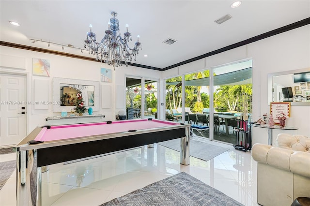 playroom with ornamental molding, pool table, an inviting chandelier, and light tile patterned floors