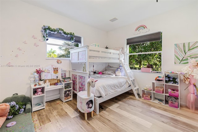 bedroom featuring hardwood / wood-style floors