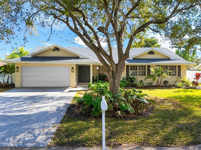 single story home with a garage