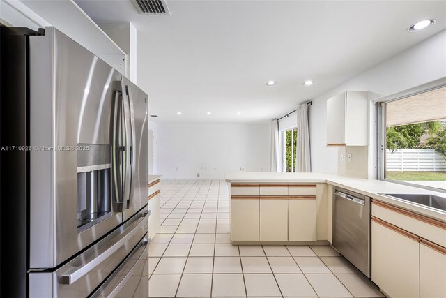 empty room featuring ceiling fan and light hardwood / wood-style floors