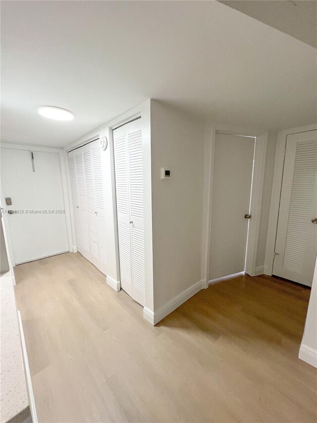 hall featuring light hardwood / wood-style flooring