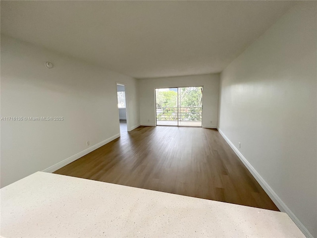 spare room featuring hardwood / wood-style floors