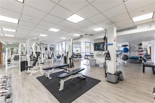 workout area featuring hardwood / wood-style flooring