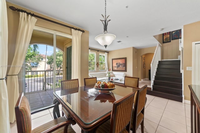 dining room featuring light tile patterned floors