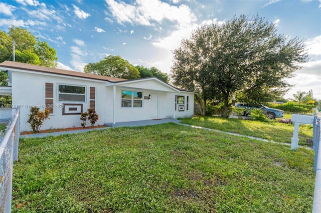 view of front of home with a front yard