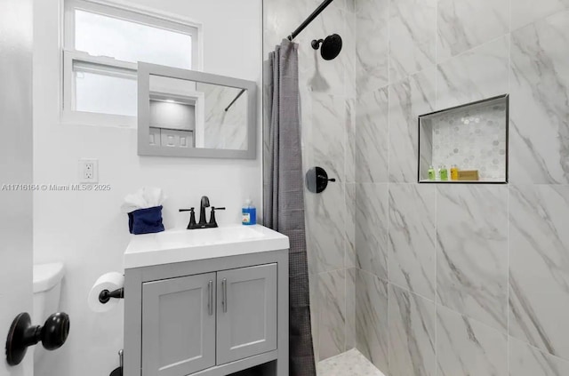 bathroom featuring vanity and a shower with curtain