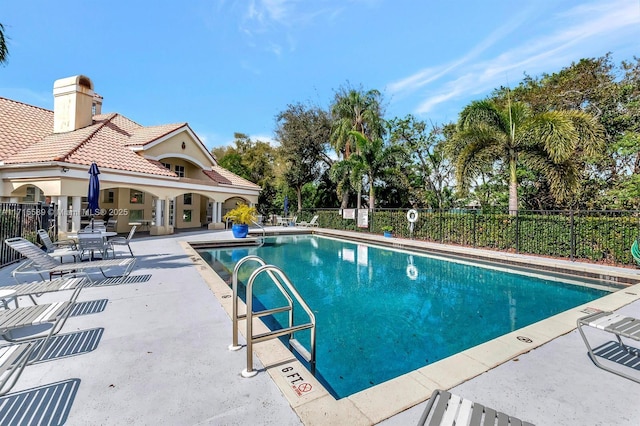 view of pool with a patio