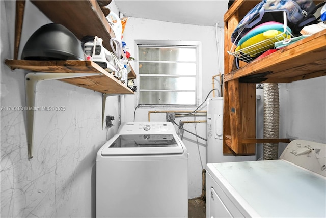 laundry room featuring washing machine and dryer