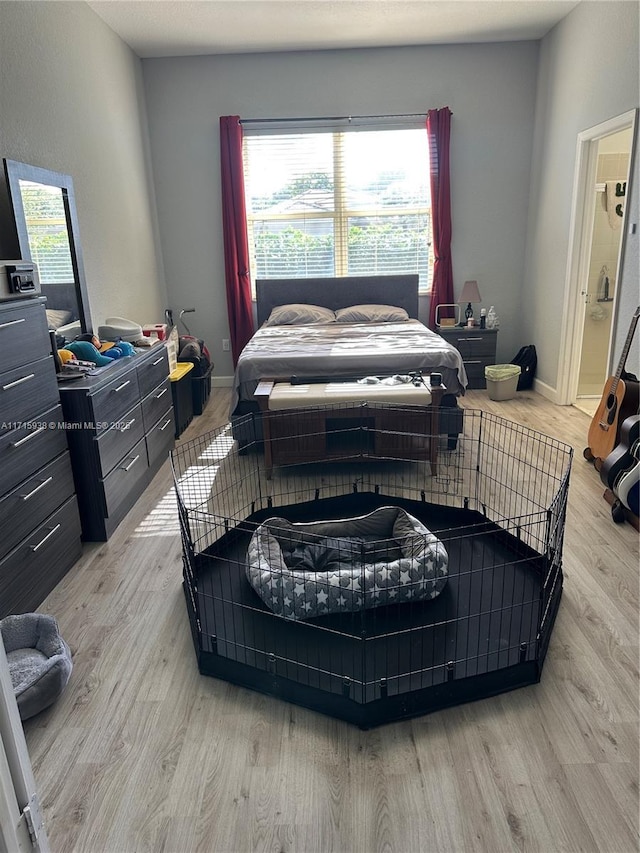 bedroom featuring light hardwood / wood-style flooring