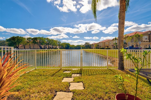 view of yard with a water view