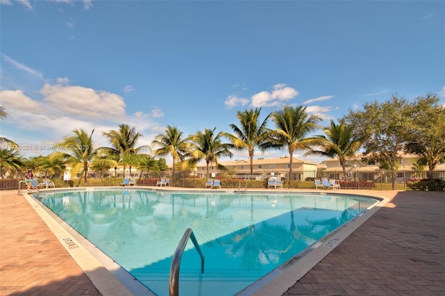 view of pool featuring a patio