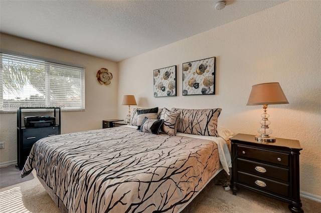 bedroom featuring light carpet