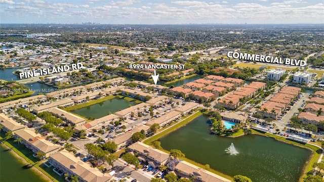 aerial view featuring a water view