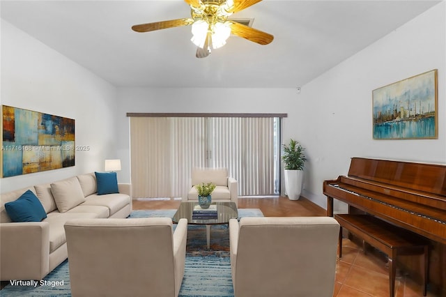 living room featuring ceiling fan and light tile patterned floors