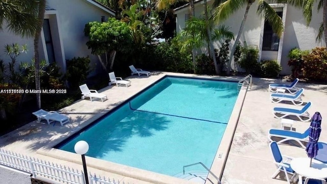 view of pool with a patio area