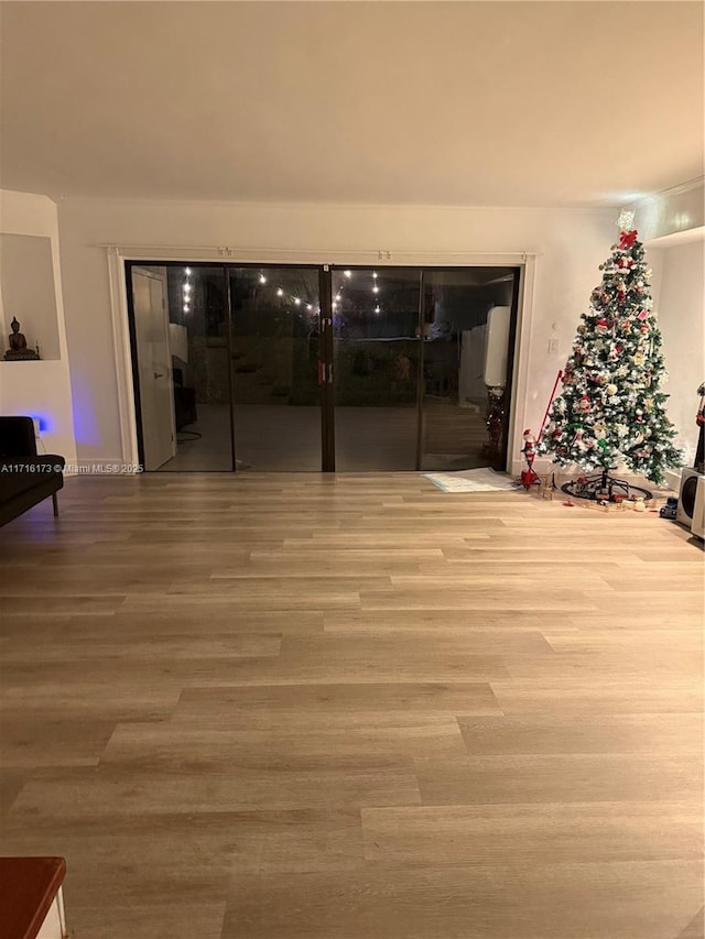 spare room featuring hardwood / wood-style flooring