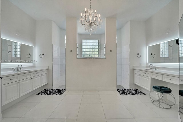 bathroom featuring tile patterned flooring, vanity, a shower, and an inviting chandelier