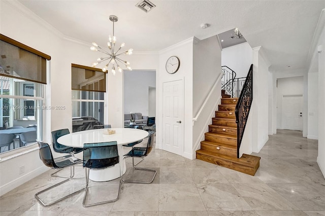 dining space featuring crown molding and an inviting chandelier