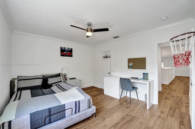 bedroom featuring ceiling fan, ornamental molding, and light wood-type flooring