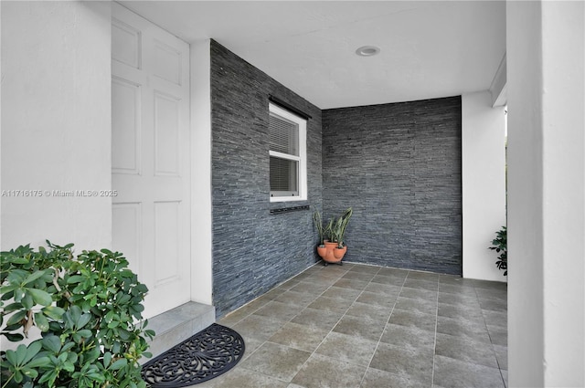 doorway to property featuring a porch