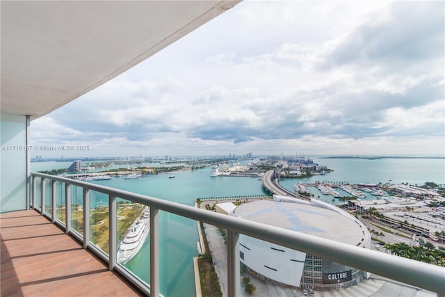 balcony featuring a water view