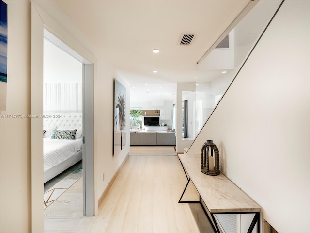 hallway featuring light hardwood / wood-style floors