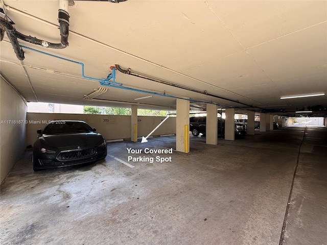 garage featuring a carport