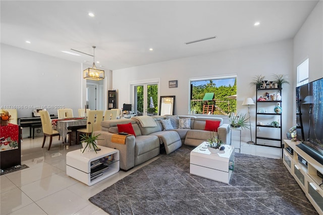 living room featuring light tile patterned flooring