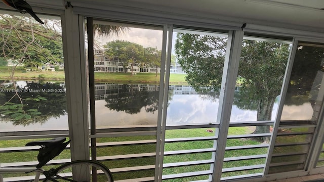 doorway featuring a water view