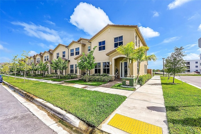 view of front of house featuring a front yard