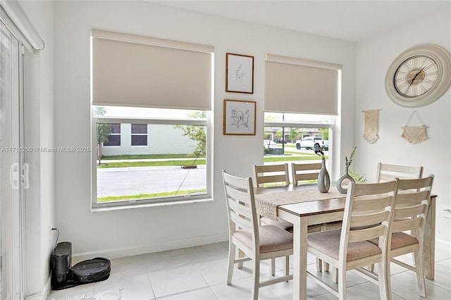 dining room featuring light tile patterned floors