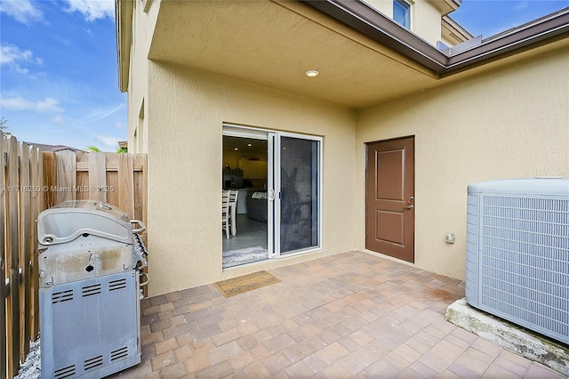 view of patio with central AC