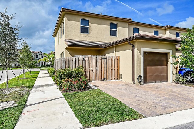 view of front of home with a garage