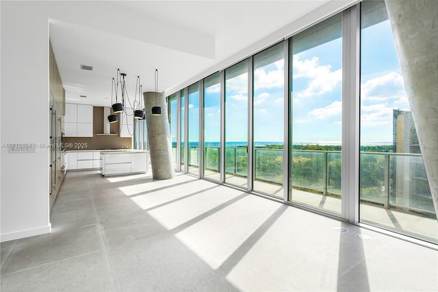 interior space with floor to ceiling windows